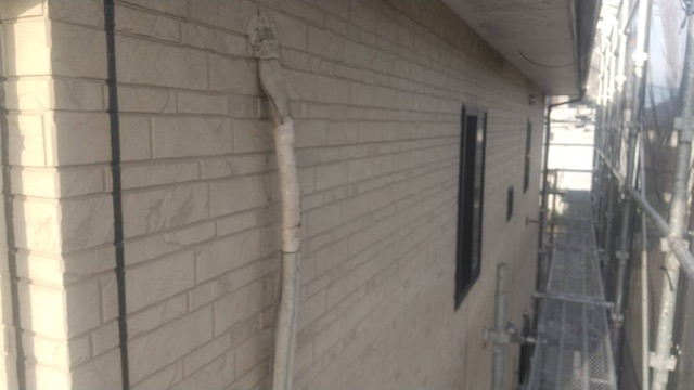 久留米市野中町のM様邸の高圧洗浄後の外壁